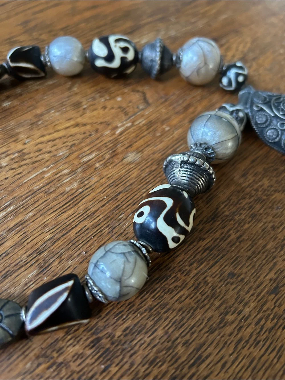 Handcrafted Stone and Silver-Tone Pendant Necklace in Browns, Cream, and silvers